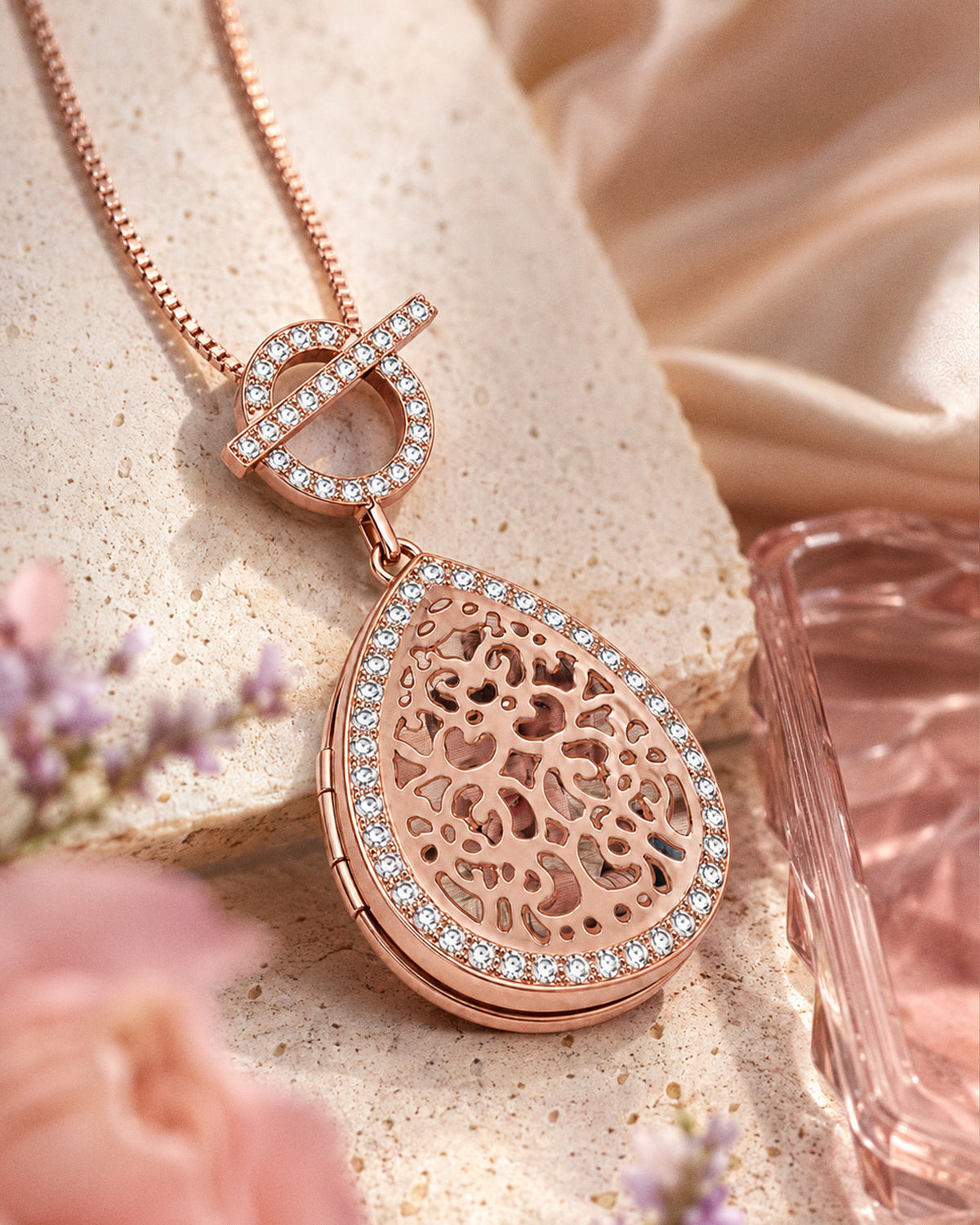Rose Gold Plated Ornate Teardrop Swivel Locket with Chain Included - lifestyle