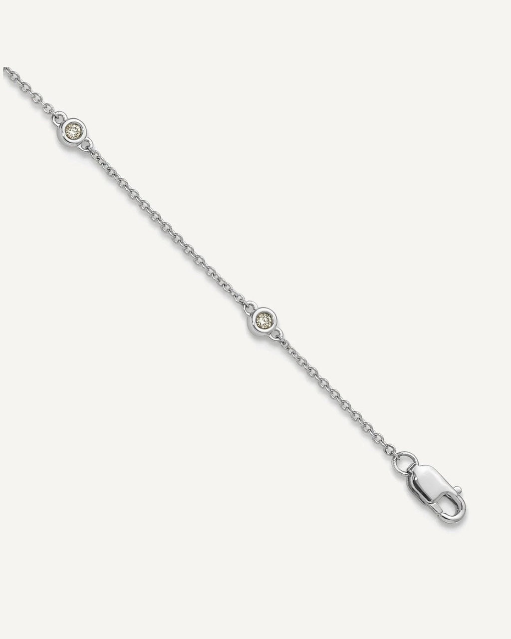 14k White Gold Complete 1/8 carat Bezel-set Diamond and Cable Chain 7-Station 9 inch Anklet – View 1