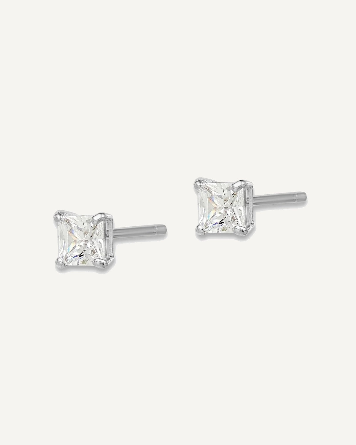 Sterling Silver Rhodium-plated Madi K ®  CZ Stud Earrings – View 2
