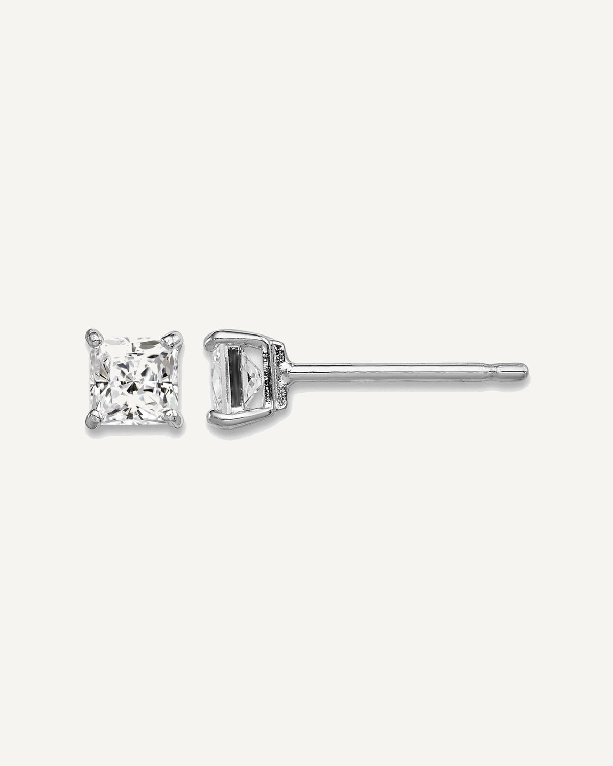 Sterling Silver Rhodium-plated Madi K ®  CZ Stud Earrings – View 1