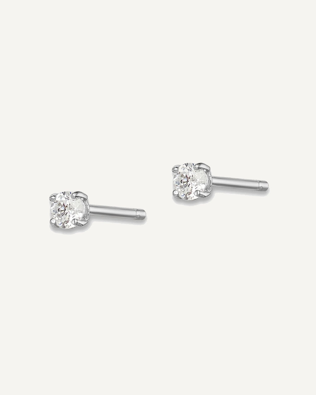 Sterling Silver Rhodium-plated Madi K ®  CZ Stud Earrings – View 19