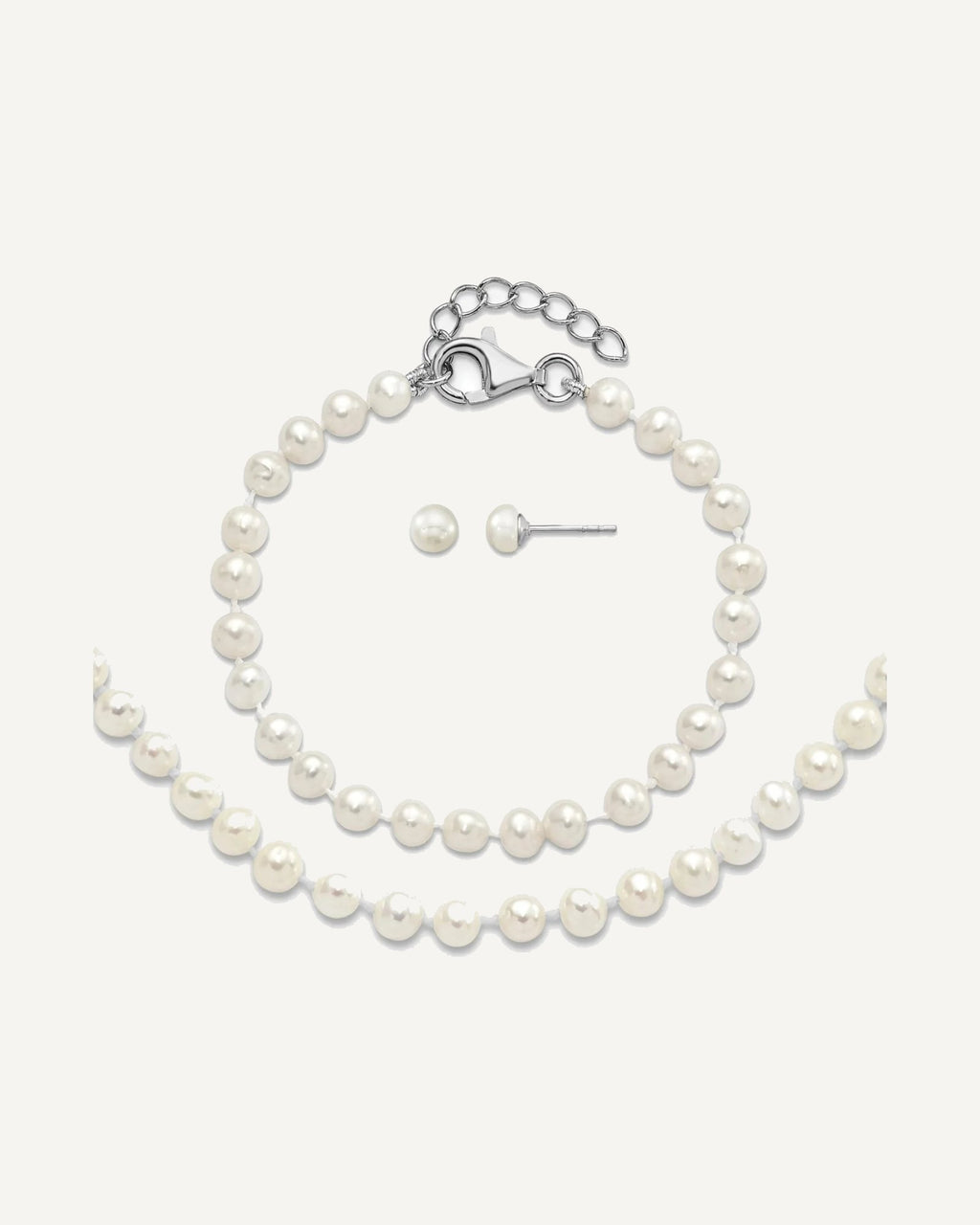Sterling Silver Rhodium-plated 4-5mm White Semi-Round Freshwater Cultured Pearl 14 inch Necklace, 5 inch Bracelet and Post Earrings Set – View 1