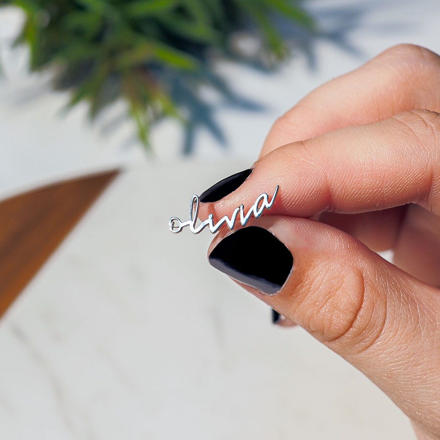 Pair Of Minimalist Script Name Earrings