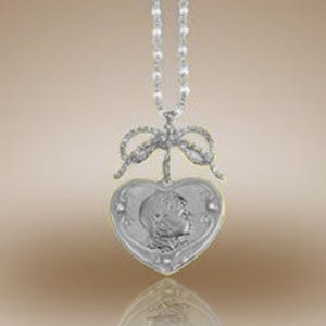 Heart Shaped Framed Pendant w/ Diamonds